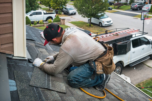 Professional Roofing technician working in Larchmont, NY